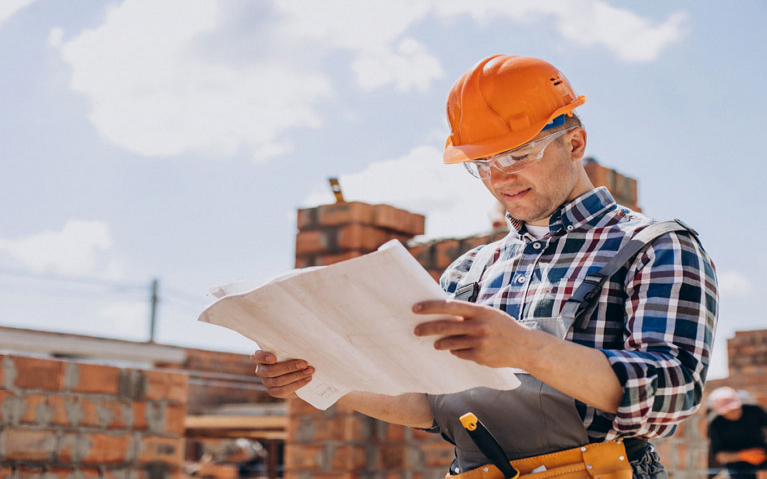 Young Craftsman Building A House 